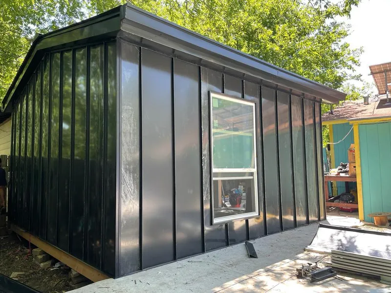 Black standing seam metal wall panels for Roof Inspection in Roscoe