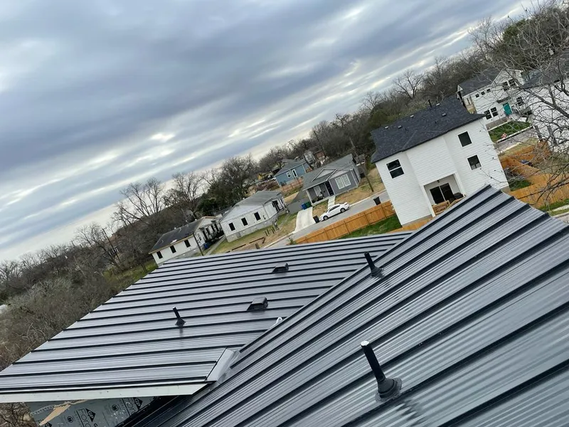 Standing seam metal roof panels with vents for Skylight Repair in Roscoe